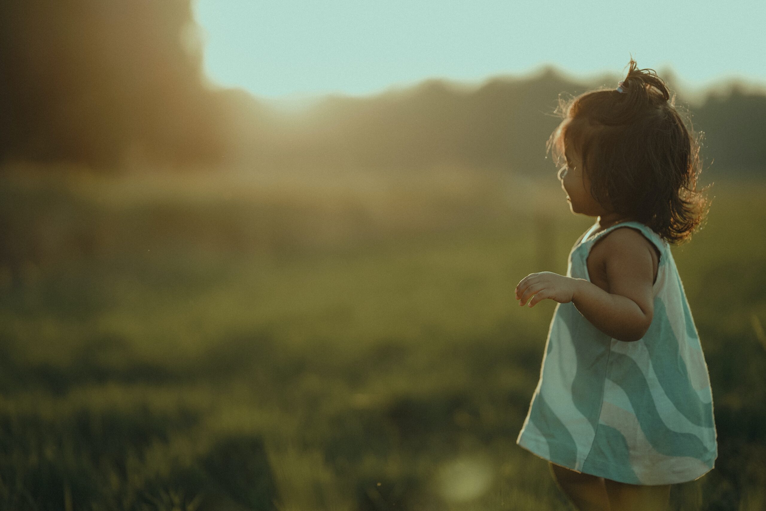 Child looking in awe at sky